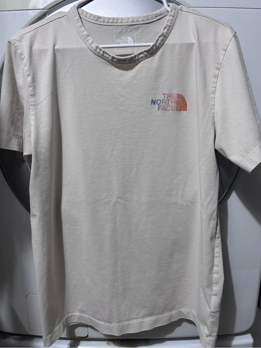 The North Face Men’s Short-Sleeve Logo Tee — Light Taupe with Multicolor Logo